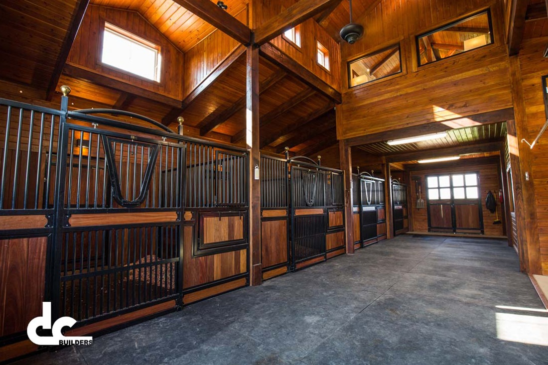 The custom stalls in this Burlington, North Carolina barn home were built by DC Builders.