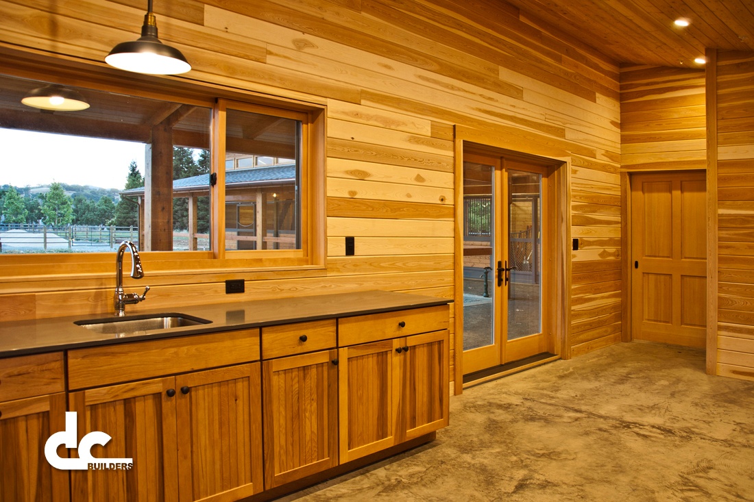 The all-wood finishings in this custom barn are a staple of what DC Builders offers.