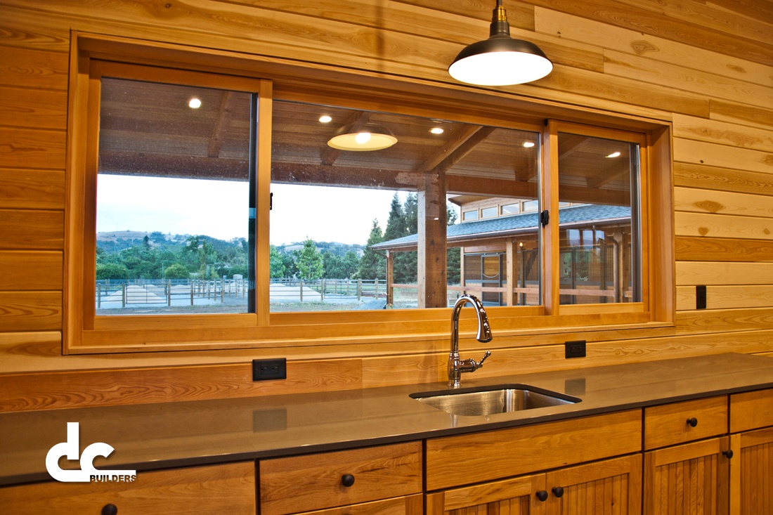 The custom finishings on this horse barn in San martin, California will make it stand out.