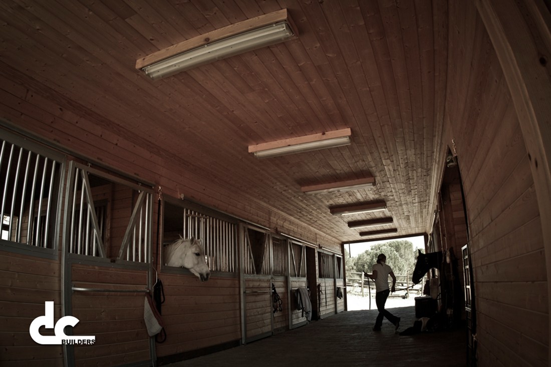 A custom horse barn from DC builders offers you a functional space to car for your horses.