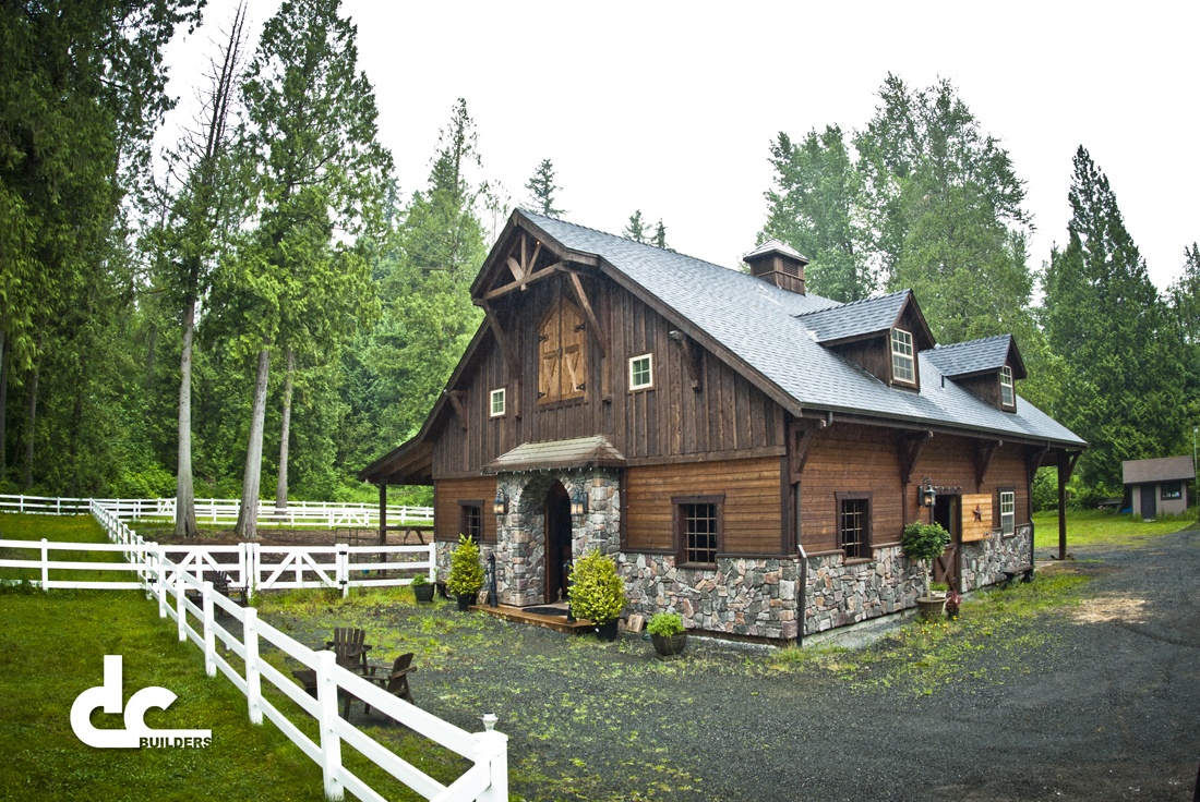 This horse barn in Bothell, Washington was designed and built by DC Builders.