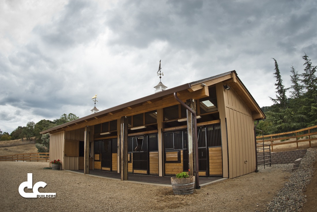 This shed row style horse barn in San Jose, California was custom built by DC Builders.