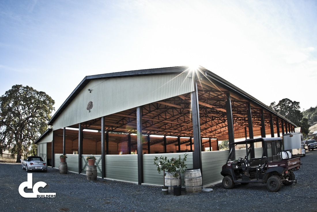 This stunning covered riding arena in Shingle Springs, California was custom designed and built by DC Builders.