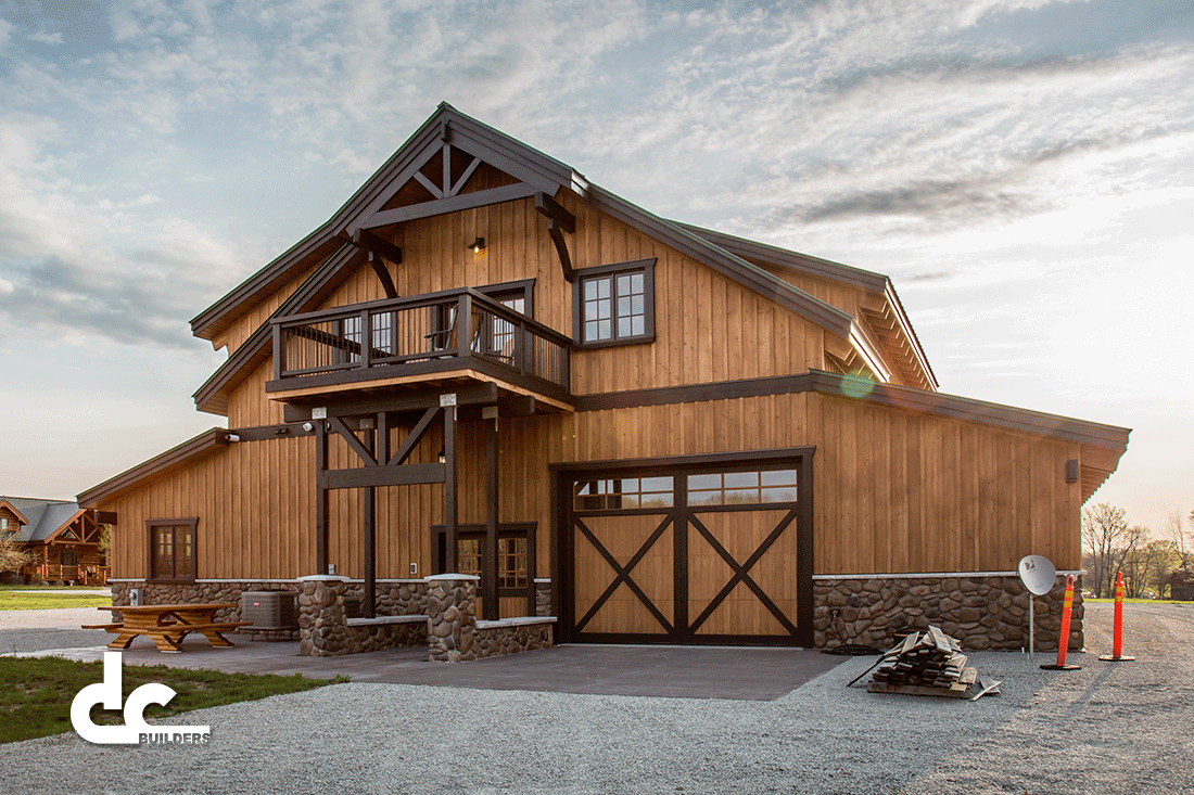 This barn home in Daggett, Michigan has spacious living quarters upstairs.