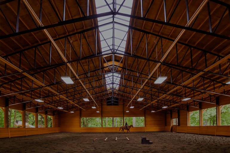 A covered riding arena will have you riding through every season.