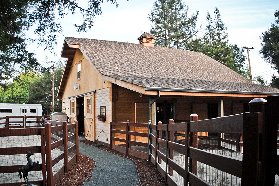 This horse barn and riding area in Los Altos, California were custom built by DC Builders.