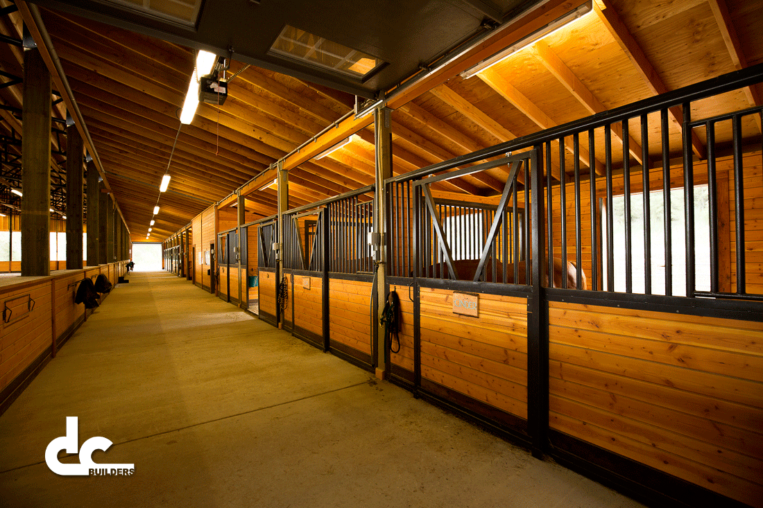 The stalls in the covered riding are and equestrian facility have everything your horses need.